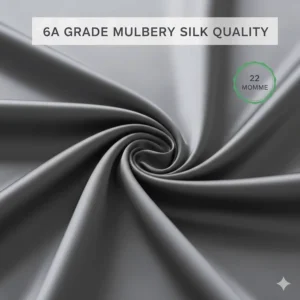 A high-quality close-up of charcoal grey 22 momme 6A grade mulberry silk fabric showcasing the premium weave and lustre.