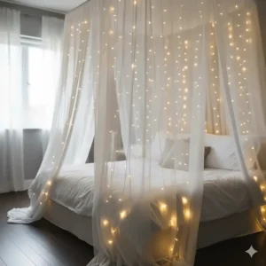 Dreamy bedroom interior showing soft white battery string lights hanging behind a sheer bed canopy and white linens.