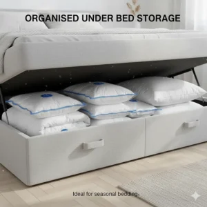 Several vacuum-sealed duvets and pillows stored neatly inside a light grey fabric ottoman bed with a lift-up storage base.