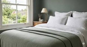 A collection of bedspreads in trending British interior colours like forest green, ochre, and dusky rose.