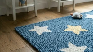 Soft, machine-washable bedside rugs in a child's bedroom featuring a playful star print.