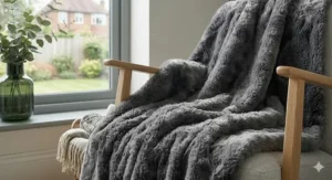 Close-up detail of a soft mink-style faux fur throw, highlighting the high-quality synthetic fibres available for under £40.
