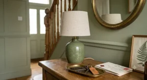 Illustration showing the height, width, and shade dimensions of a standard ceramic table lamp to help buyers gauge its size.